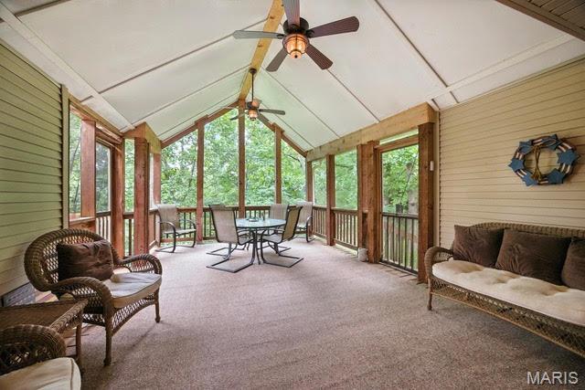 1423 Emily Ln, Festus, MO 63028 - sunroom / solarium featuring ceiling fan and outdoor dining area