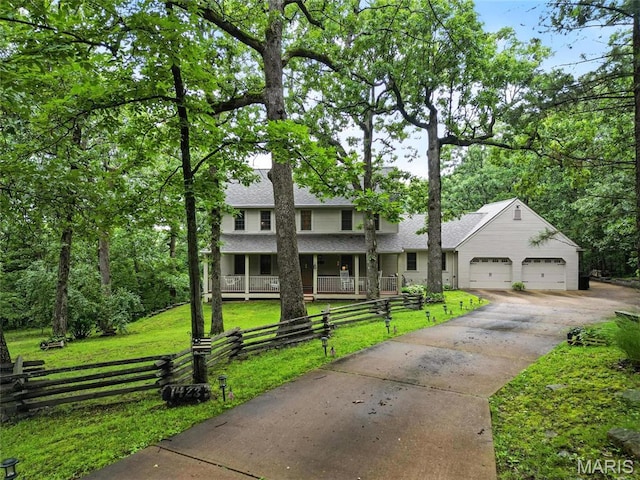 1423 Emily Ln, Festus, MO 63028 - view of front of property featuring covered porch, driveway, a garage, and roof with shingles