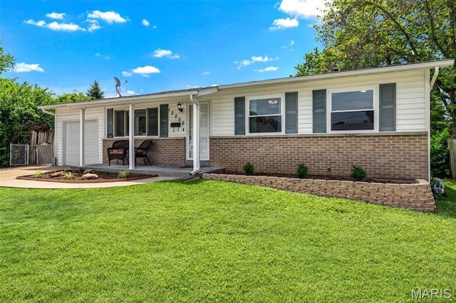 12006 Glengrove Dr, Maryland Heights, MO 63043 - ranch-style home featuring brick siding, a garage, covered porch, and a front yard