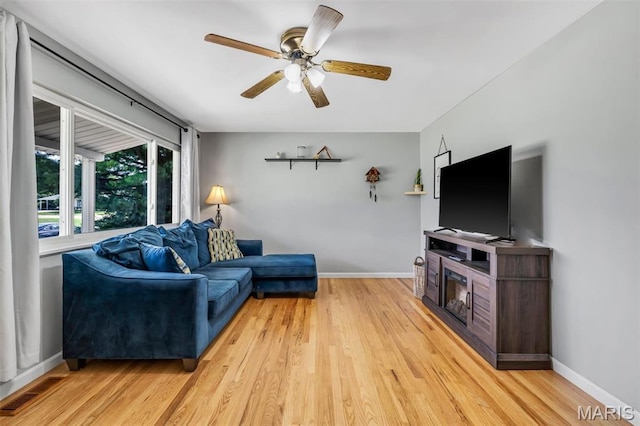 12006 Glengrove Dr, Maryland Heights, MO 63043 - living room with light wood-type flooring and a ceiling fan