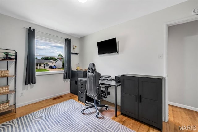 12006 Glengrove Dr, Maryland Heights, MO 63043 - home office featuring light wood-style flooring