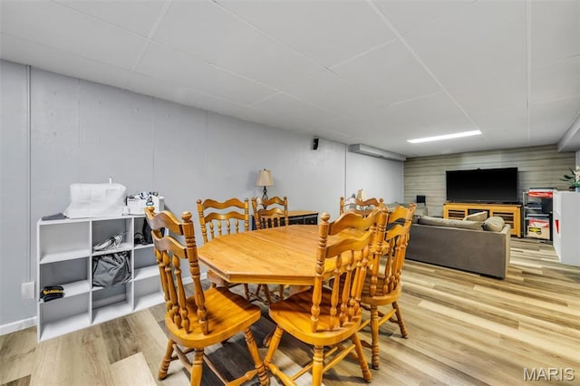 12006 Glengrove Dr, Maryland Heights, MO 63043 - dining room featuring light wood finished floors and a drop ceiling