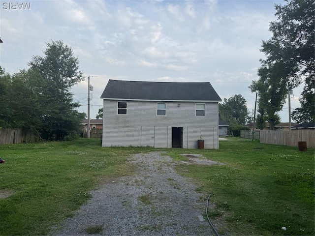 711 E Gladys St, Sikeston, MO 63801 - back of house with driveway