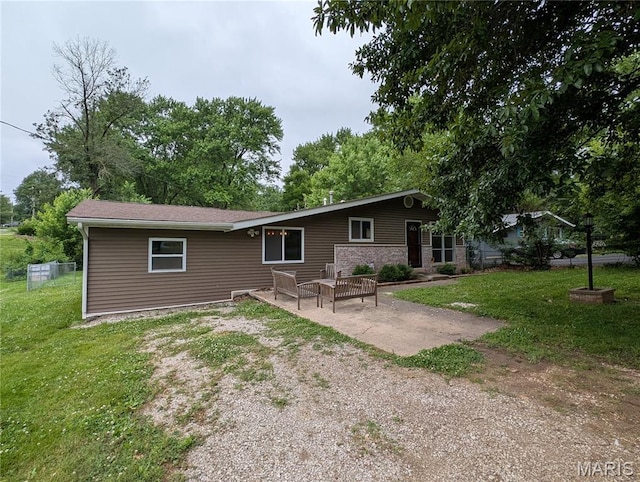 326 S Elm St, Bethalto, IL 62010 - view of front facade with a front yard and a patio area