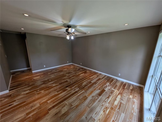 326 S Elm St, Bethalto, IL 62010 - spare room featuring ceiling fan, baseboards, wood finished floors, and recessed lighting