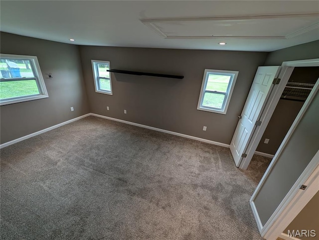 326 S Elm St, Bethalto, IL 62010 - unfurnished bedroom featuring attic access, carpet floors, baseboards, a walk in closet, and recessed lighting