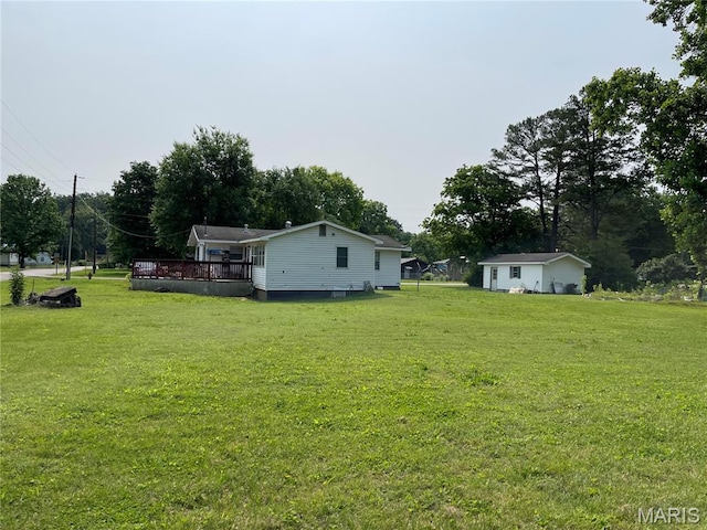 402 Legion Park Rd, Piedmont, MO 63957 - view of green lawn with a deck and view of scattered trees