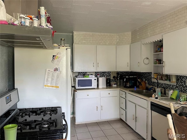 402 Legion Park Rd, Piedmont, MO 63957 - kitchen with white appliances, a sink, light countertops, and white cabinetry