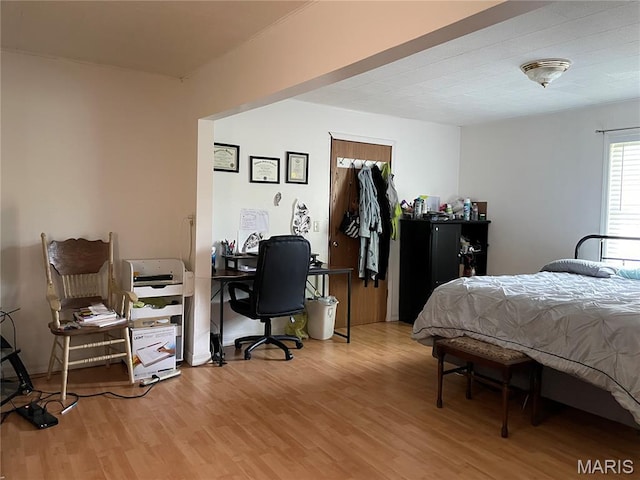 402 Legion Park Rd, Piedmont, MO 63957 - bedroom with wood finished floors and a desk
