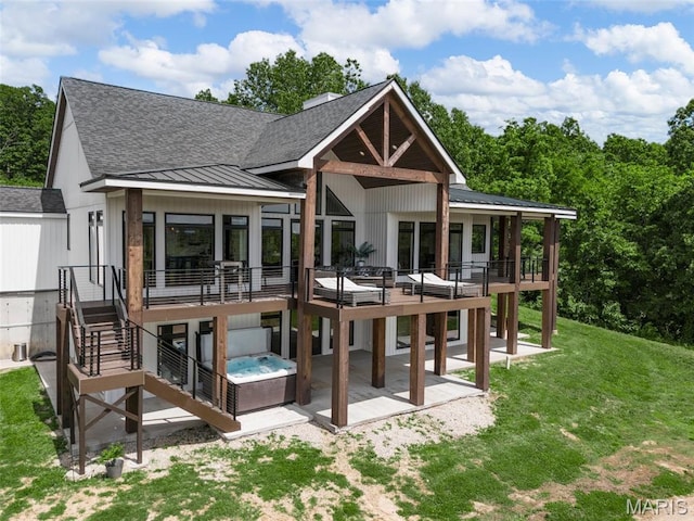 22206 Tree Farm Rd, Hermann, MO 63383 - rear view of property with a hot tub, roof with shingles, a patio, stairway, and a wooden deck