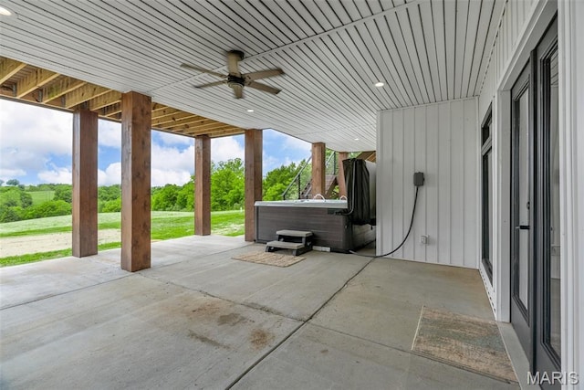 22206 Tree Farm Rd, Hermann, MO 63383 - view of patio / terrace with a hot tub and a ceiling fan