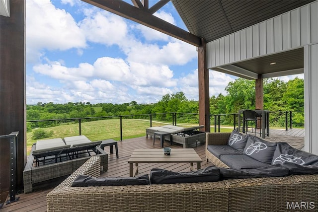 22206 Tree Farm Rd, Hermann, MO 63383 - wooden deck featuring an outdoor living space and view of scattered trees