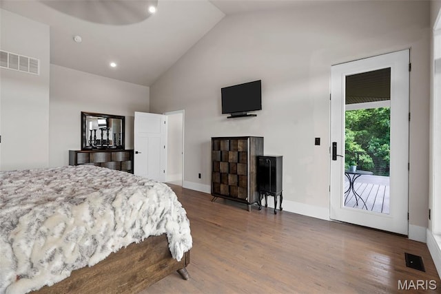 22206 Tree Farm Rd, Hermann, MO 63383 - bedroom featuring access to exterior, high vaulted ceiling, wood finished floors, baseboards, and recessed lighting