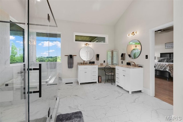 22206 Tree Farm Rd, Hermann, MO 63383 - ensuite bathroom with vanity, baseboards, a bath, a marble finish shower, and marble look tiles
