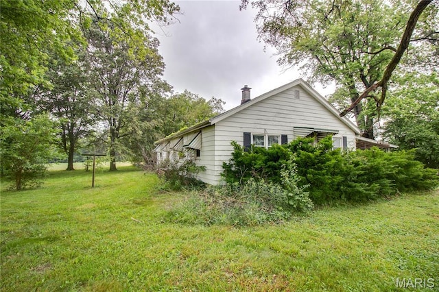 33974 Irish Ln, Brighton, IL 62012 - view of property exterior featuring a yard
