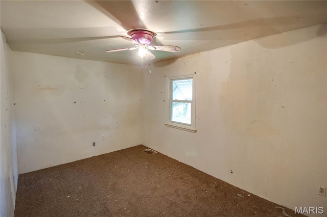 33974 Irish Ln, Brighton, IL 62012 - empty room featuring carpet floors and a ceiling fan