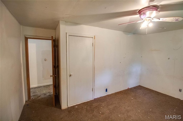 33974 Irish Ln, Brighton, IL 62012 - unfurnished bedroom with carpet, a closet, and ceiling fan