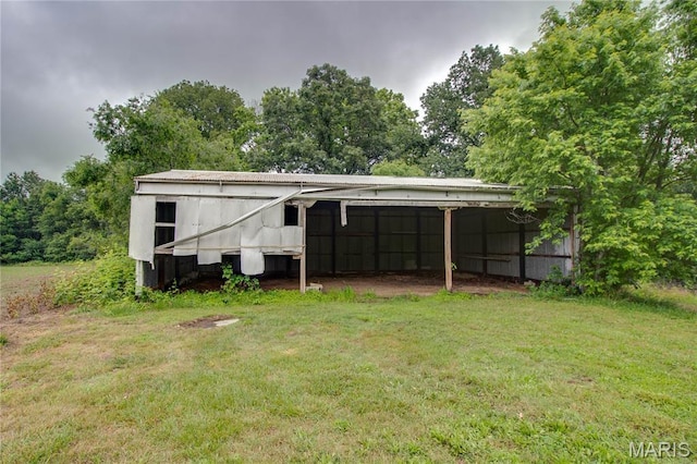 33974 Irish Ln, Brighton, IL 62012 - view of pole building featuring a lawn and a detached carport