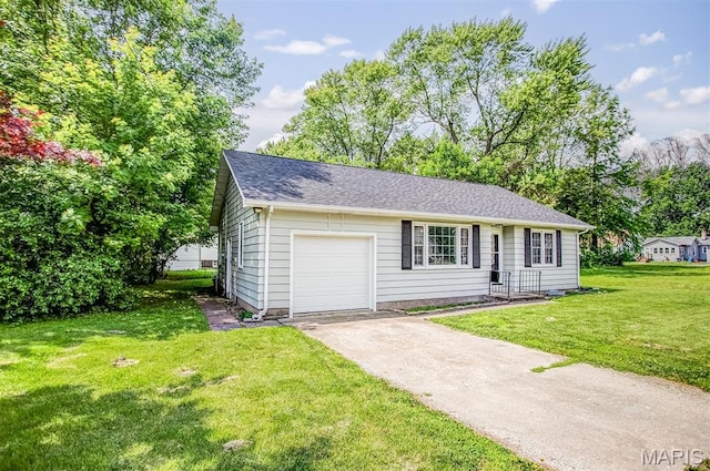 420 E Hauser St, Litchfield, IL 62056 - view of front of house featuring concrete driveway, a front lawn, and a shingled roof