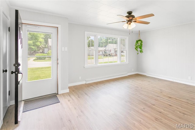 420 E Hauser St, Litchfield, IL 62056 - foyer entrance with a baseboard radiator, ornamental molding, healthy amount of natural light, light wood-type flooring, and ceiling fan