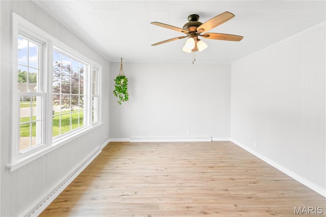 420 E Hauser St, Litchfield, IL 62056 - unfurnished room featuring ornamental molding, light wood-style floors, a ceiling fan, and baseboards