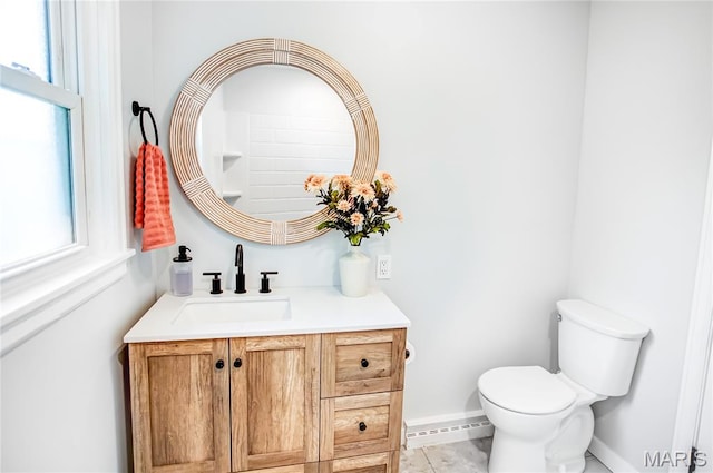 420 E Hauser St, Litchfield, IL 62056 - bathroom with vanity, toilet, and baseboards