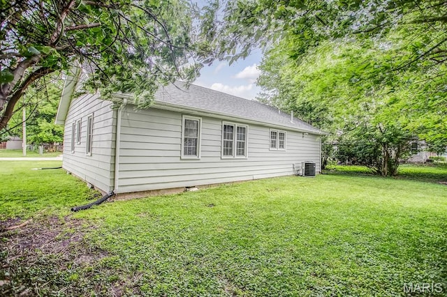 420 E Hauser St, Litchfield, IL 62056 - rear view of house with cooling unit and a yard