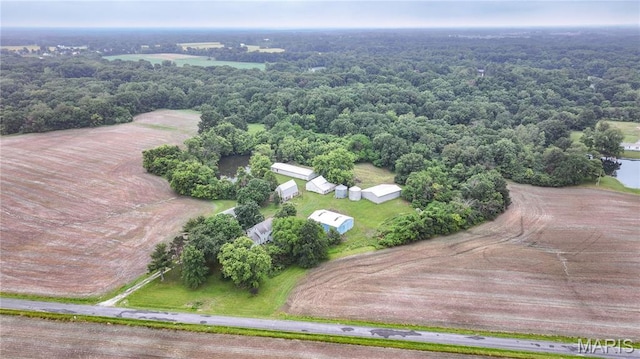 33425 Irish Ln, Brighton, IL 62012 - aerial view of property and surrounding area with a heavily wooded area