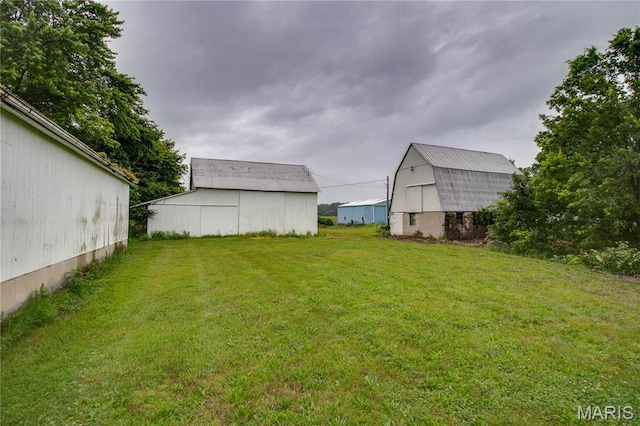 33425 Irish Ln, Brighton, IL 62012 - view of grassy yard with a barn and an outdoor structure