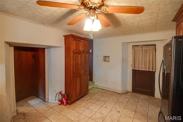 33425 Irish Ln, Brighton, IL 62012 - empty room featuring ceiling fan and light tile patterned floors