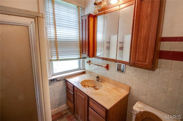33425 Irish Ln, Brighton, IL 62012 - bathroom with tile walls and vanity