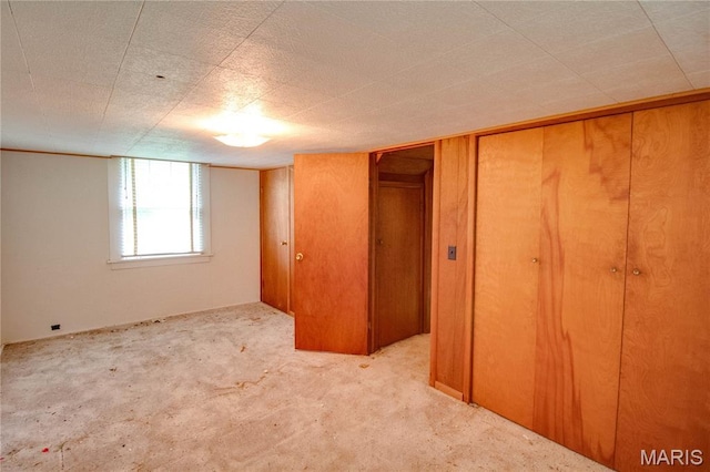 33425 Irish Ln, Brighton, IL 62012 - unfurnished bedroom with carpet and a closet