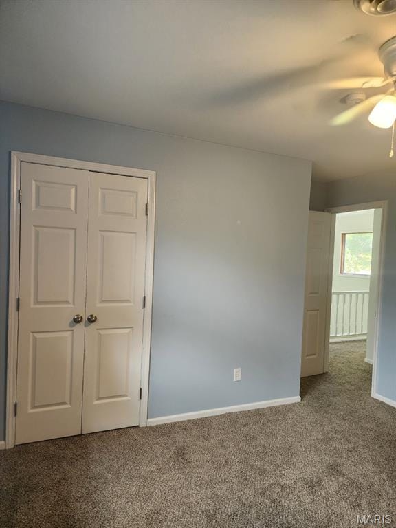 108 Auburn Dr, Waynesville, MO 65583 - empty room featuring carpet floors, baseboards, and a ceiling fan