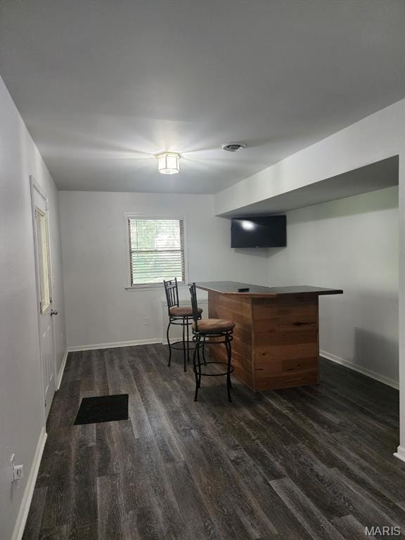 108 Auburn Dr, Waynesville, MO 65583 - bar area featuring wood finished floors and baseboards