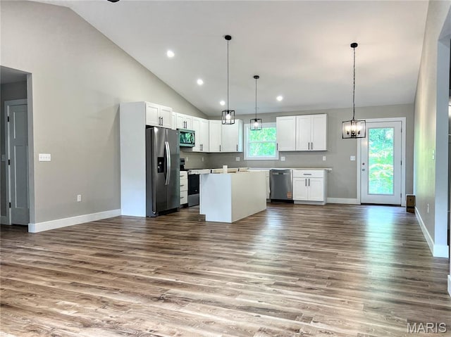 518 Rue Lamande, Bonne Terre, MO 63628 - kitchen featuring stainless steel appliances, white cabinets, a kitchen island, wood finished floors, and recessed lighting