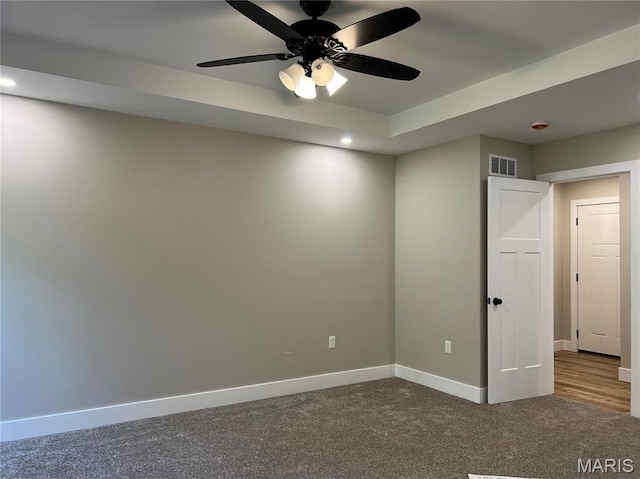 518 Rue Lamande, Bonne Terre, MO 63628 - spare room with baseboards, dark colored carpet, recessed lighting, and ceiling fan