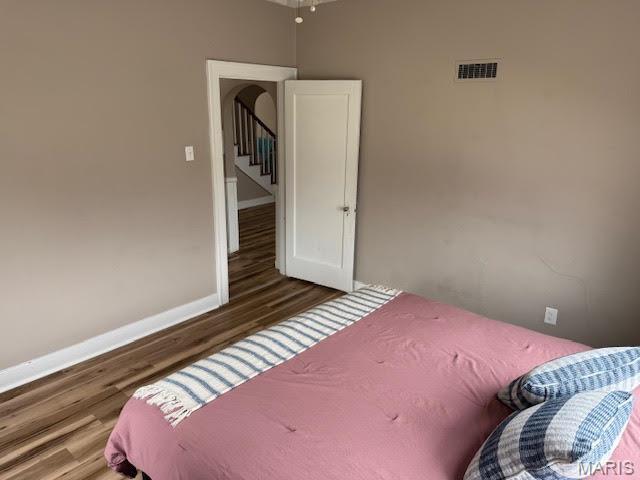 10303 Lincoln Trl, Fairview Heights, IL 62208 - bedroom featuring wood finished floors and baseboards