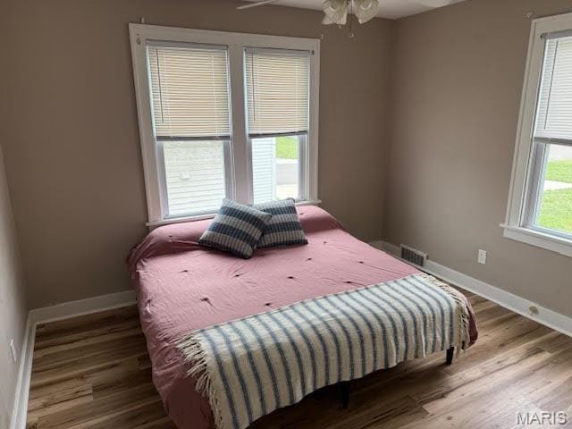 10303 Lincoln Trl, Fairview Heights, IL 62208 - bedroom with wood finished floors and baseboards