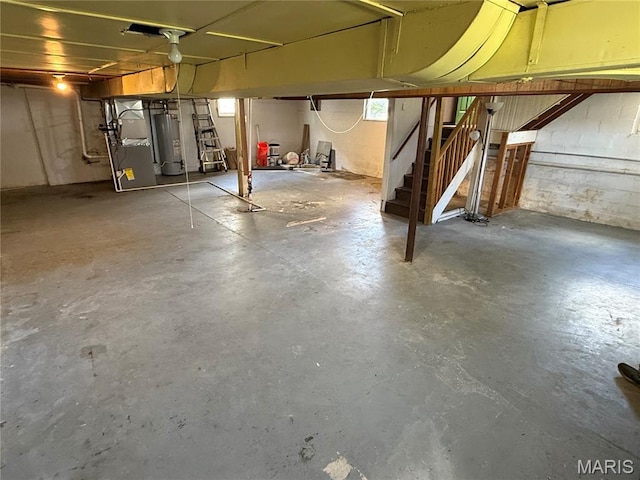 10303 Lincoln Trl, Fairview Heights, IL 62208 - below grade area featuring water heater, stairway, and heating unit
