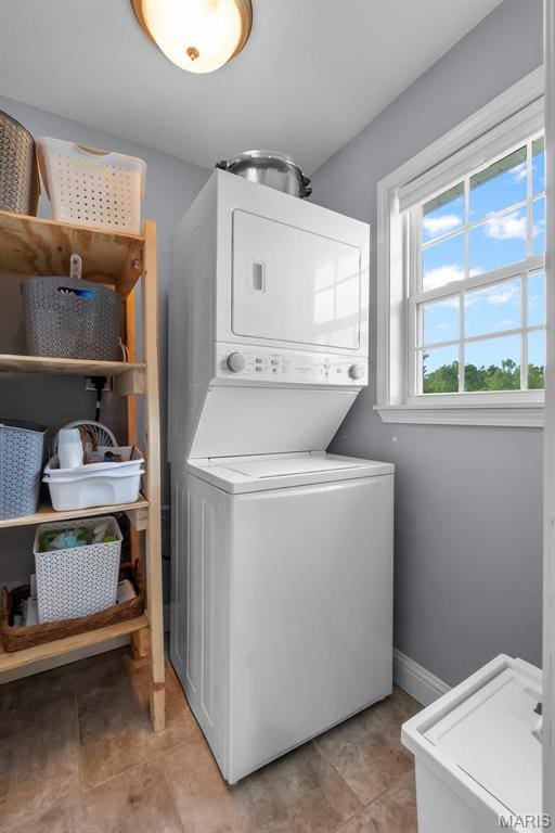 147 Old Towne Ln, Cape Girardeau, MO 63701 - laundry room with estacked washer and dryer and baseboards