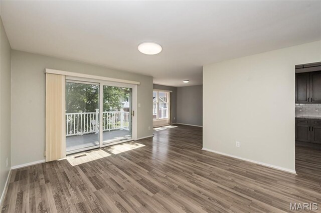 2237 Ole Castle Ct, Chesterfield, MO 63017 - spare room with wood finished floors and baseboards