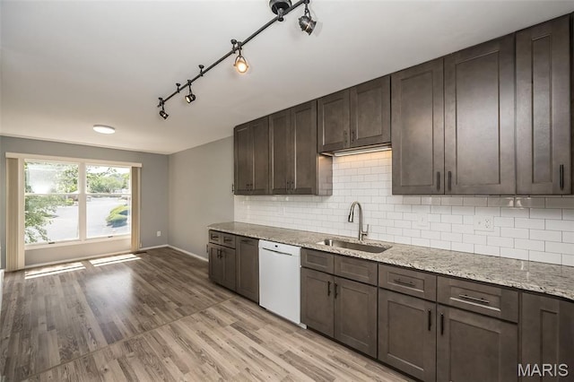 2237 Ole Castle Ct, Chesterfield, MO 63017 - kitchen with dishwasher, dark brown cabinets, and tasteful backsplash