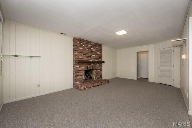 2237 Ole Castle Ct, Chesterfield, MO 63017 - unfurnished living room with a brick fireplace, carpet floors, and wood walls