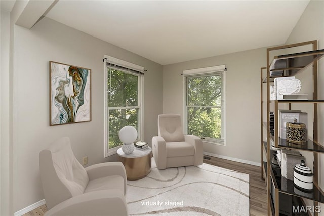 2237 Ole Castle Ct, Chesterfield, MO 63017 - sitting room with healthy amount of natural light and wood finished floors