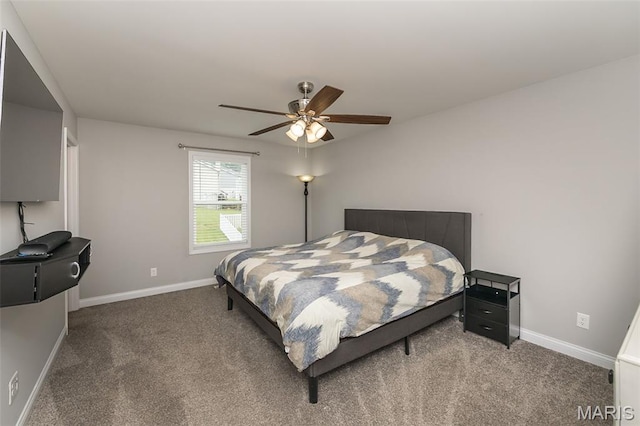 424 Triathlon Dr, Foristell, MO 63348 - carpeted bedroom with baseboards and ceiling fan