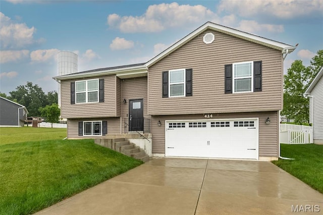 424 Triathlon Dr, Foristell, MO 63348 - bi-level home with an attached garage and driveway