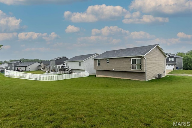 424 Triathlon Dr, Foristell, MO 63348 - back of property featuring a residential view and central AC