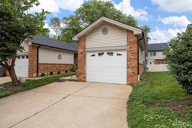 205 Fawn Meadow Ct, Ofallon, MO 63366 - view of front of home featuring brick siding and driveway