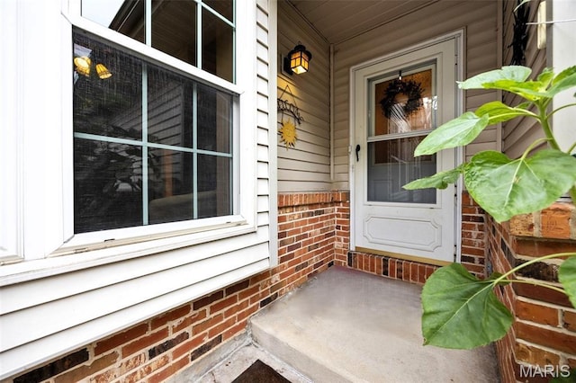 205 Fawn Meadow Ct, Ofallon, MO 63366 - entrance to property featuring a porch and brick siding