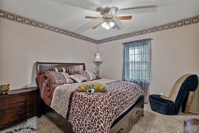 17504 Division St, Kennett, MO 63857 - carpeted bedroom featuring a textured ceiling and ceiling fan